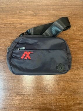 Vuori Black Hip Bag with Red Accent